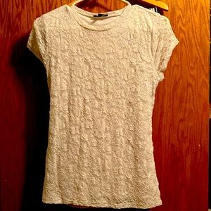 Size small white short sleeve blouse with flower detail